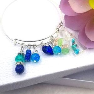 silver toned bangle cuff Adustible charm bracelet hand made.
